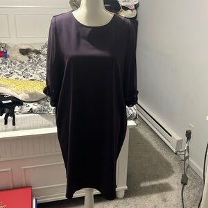 purple one piece dress with monilli
